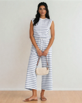 A cozy and stylish two-piece loungewear set in sail blue featuring a short-sleeve striped tee and matching high-waisted wide-leg pants with a drawstring waist.