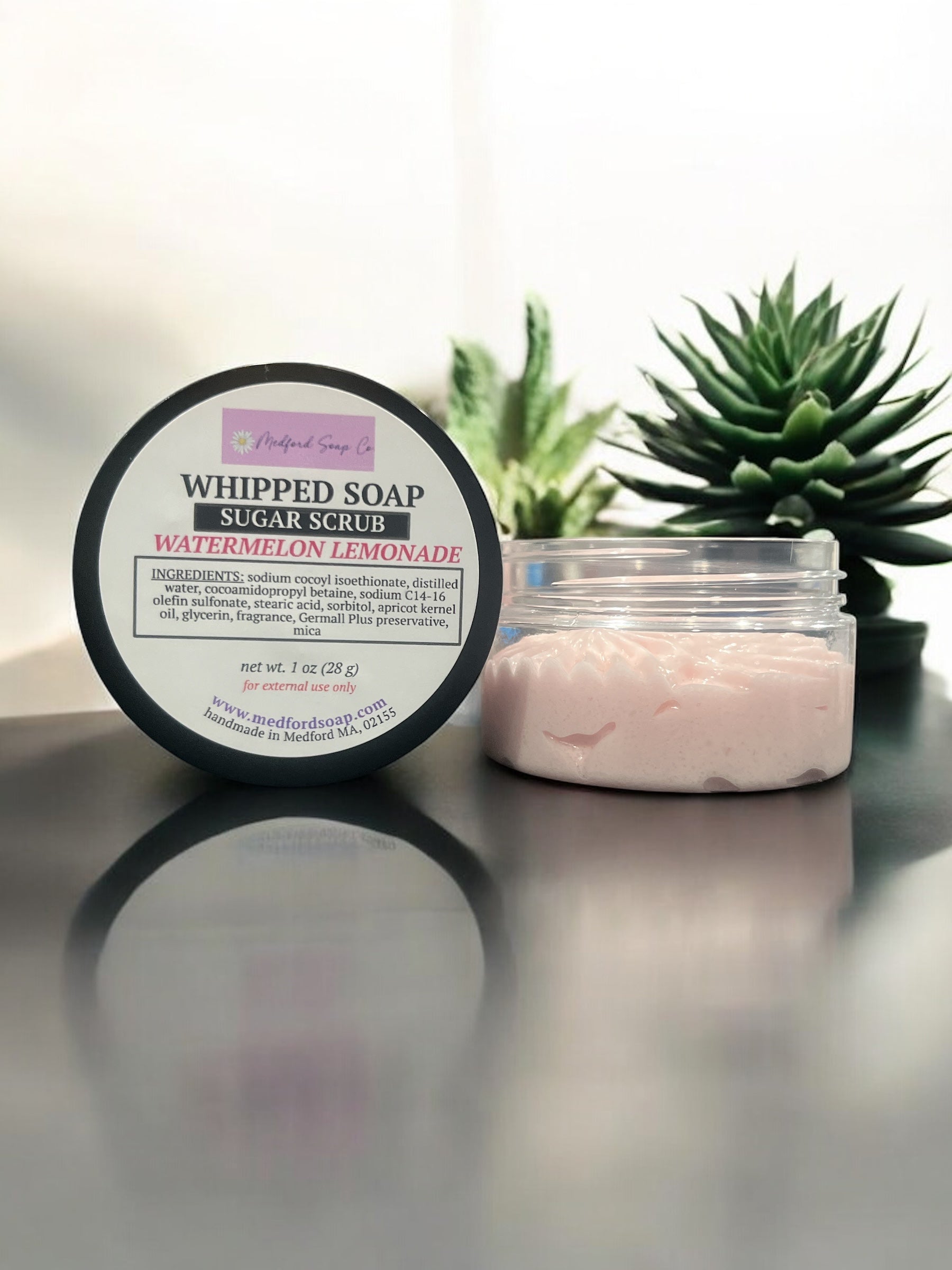 A thick, fluffy jar of whipped soap sugar scrub showing a light and airy texture, handmade by Medford Soap Co. for AllyBay.