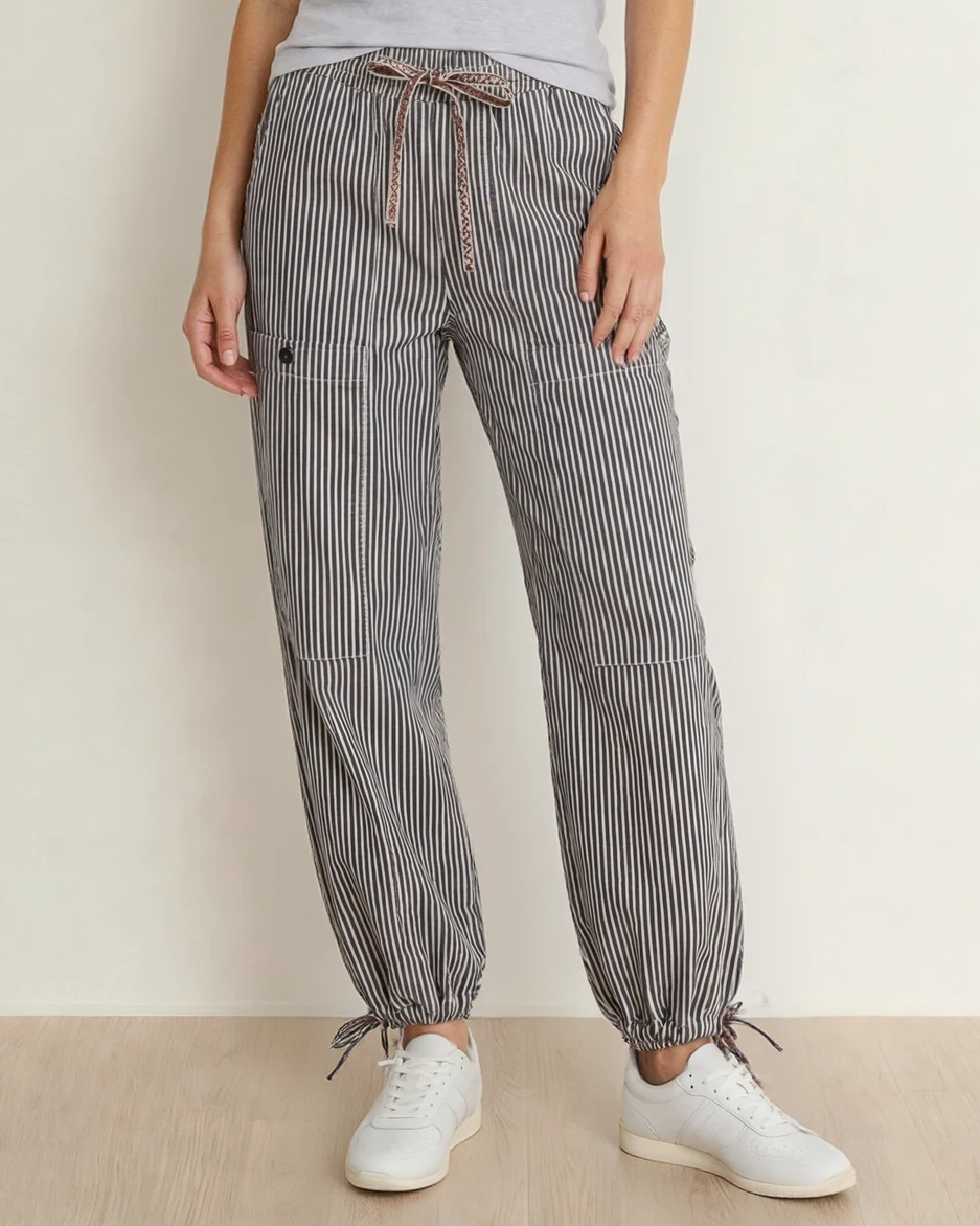 Front view of the Collins casual utility pants in a khaki stripe pattern, showcasing the adjustable drawstring elastic waistband, large front patch pockets, and customizable drawstring ankle cuffs.