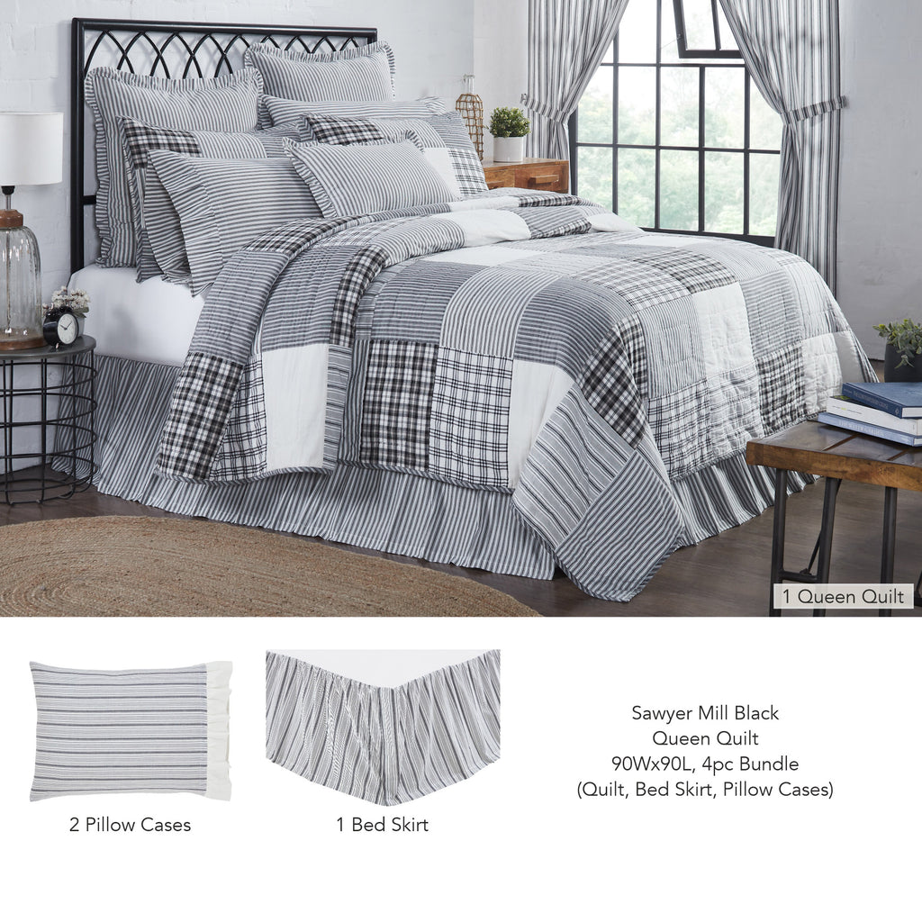 Sawyer Mill Charcoal queen bedding bundle featuring a 100% cotton patchwork quilt with rustic gray, black, and cream stripes and plaids styled on a queen bed.