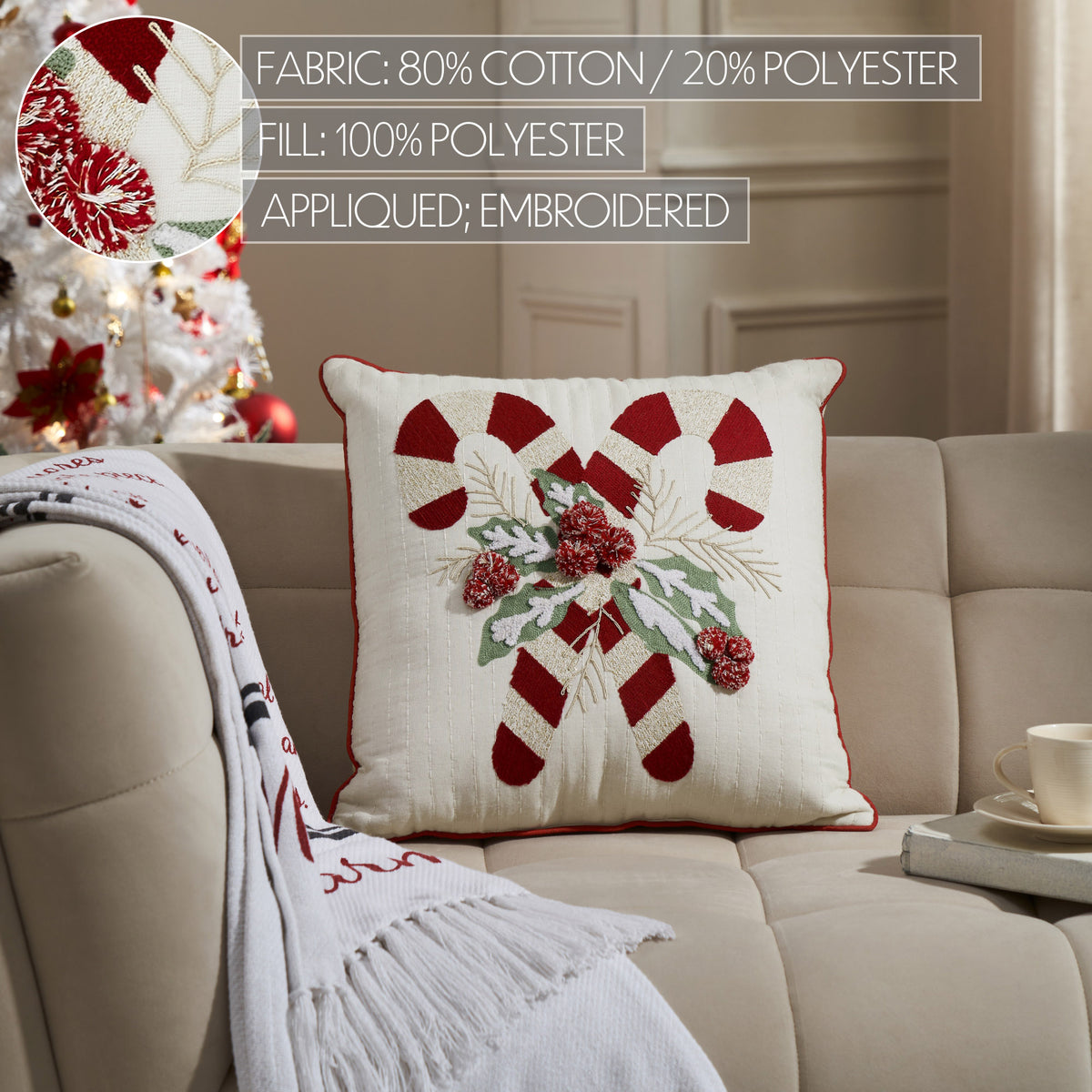 Living room setup showing the candy cane pillow styled alongside matching holiday decor on a sofa.