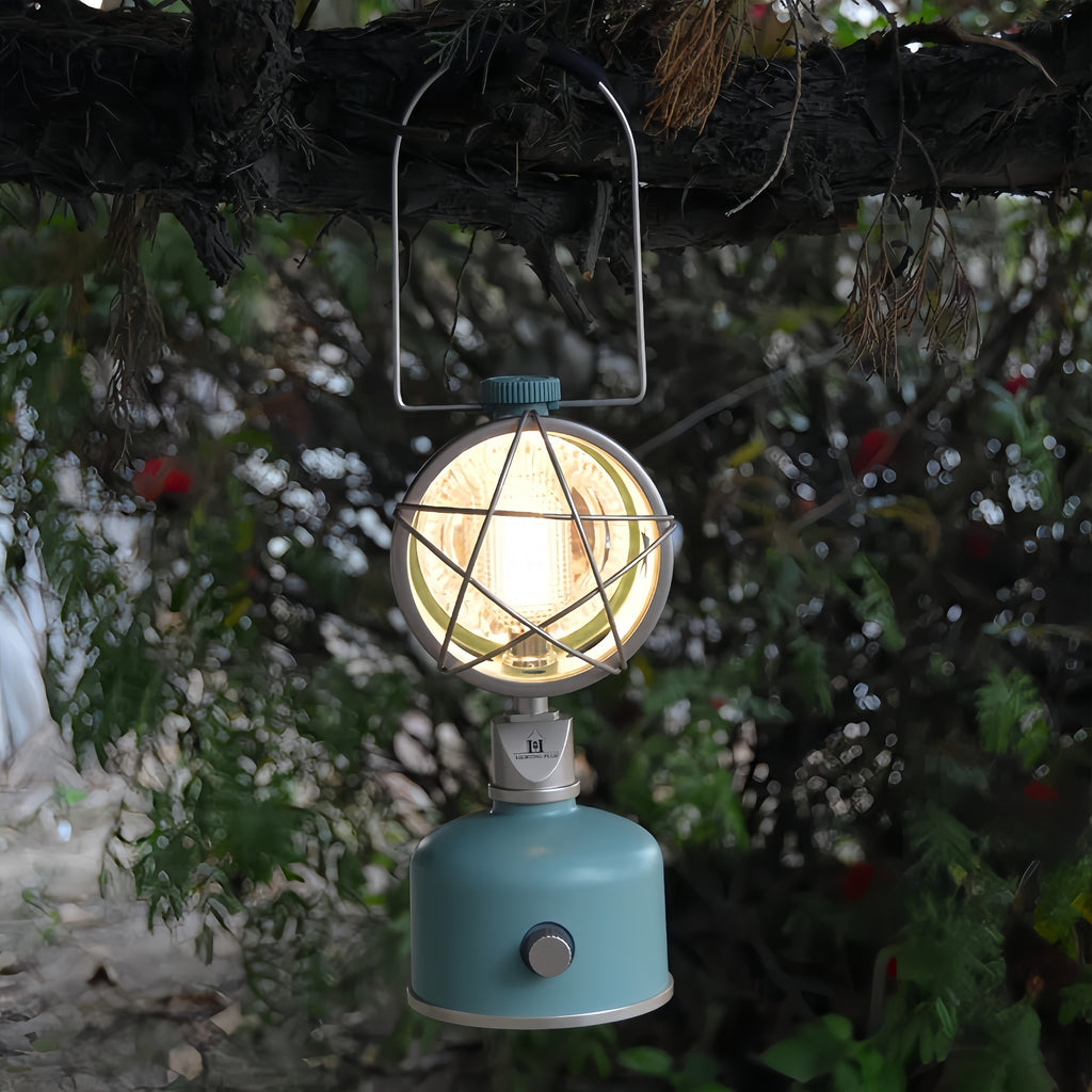 Warm glowing solar garden lantern hanging outside at night