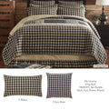 My Country King Quilt set styled on a bed with black and tan gingham pattern and matching shams.