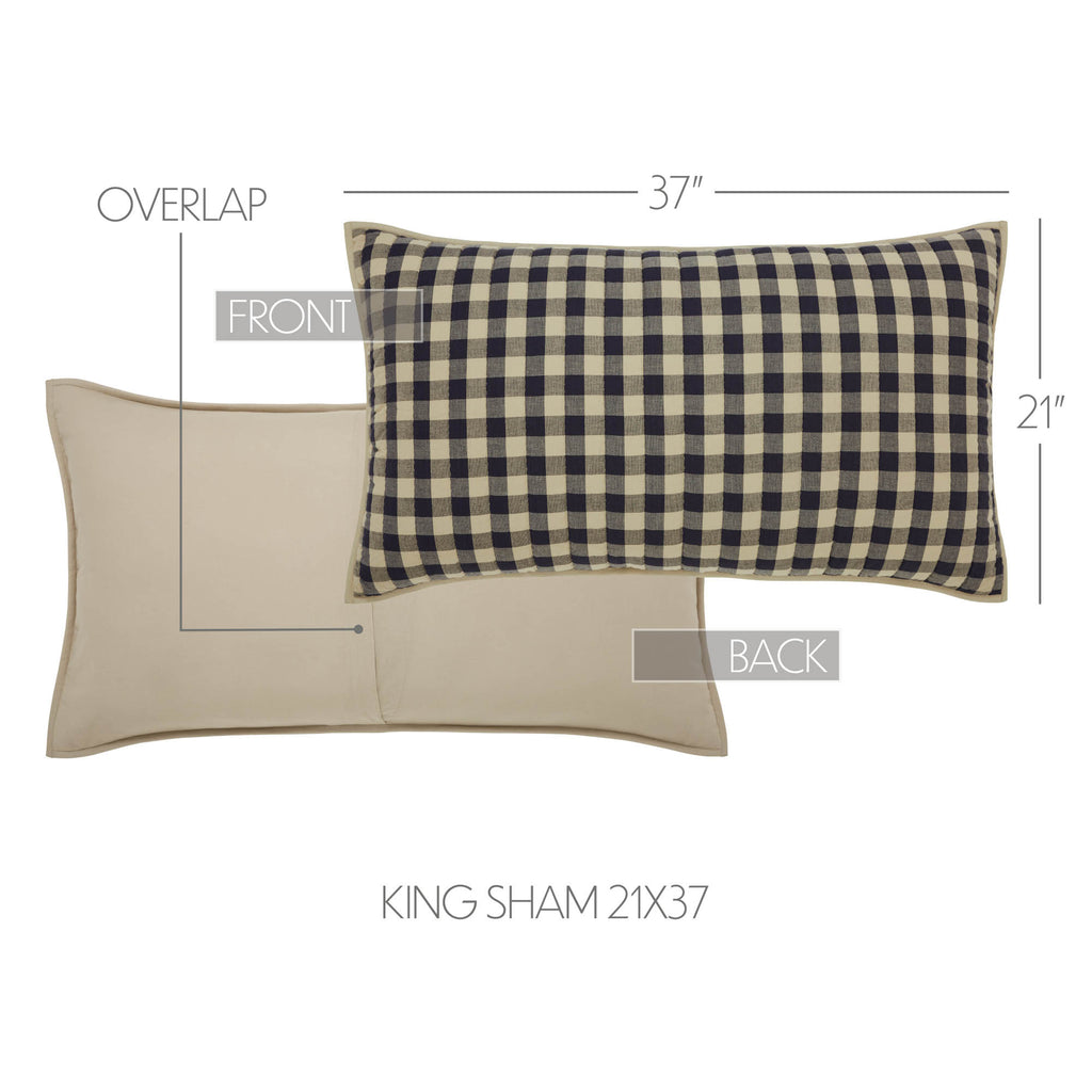 Solid tan pillow sham with piped trim.