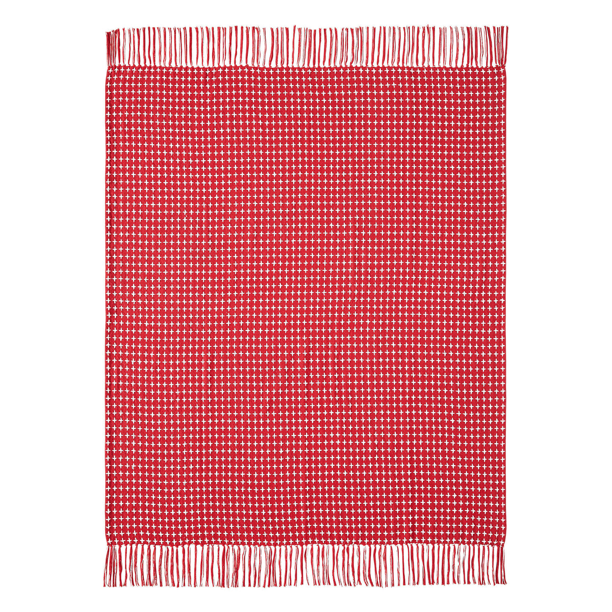 Flat lay product view showing the red and white woven plaid pattern and fringe trim edge of the throw blanket.
