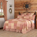Sawyer Mill Red Patchwork Quilt with country red and tan hand-quilting for the Sanctuaries for the Strange collection.