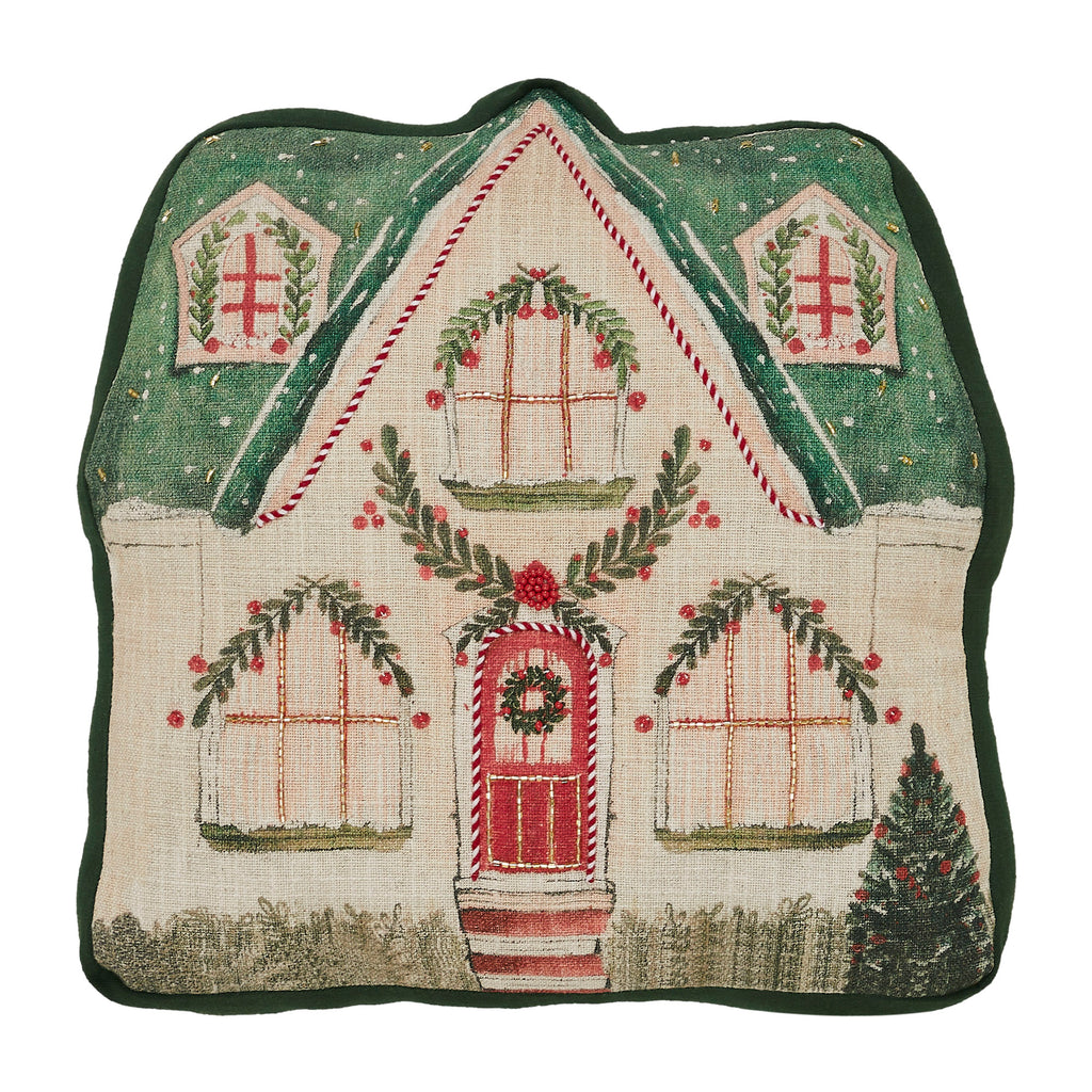 Isolated front view of the gingerbread house pillow showcasing the embroidered windows, door wreath, and trim details.